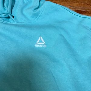 New with tags Reebok extra large woman’s pullover sweatshirt cute as a button